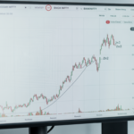 Gann Theory Explained: Use Price–Time Levels Without the Hype Gann theory guide showing Gann angles and Square of Nine on a trading chart